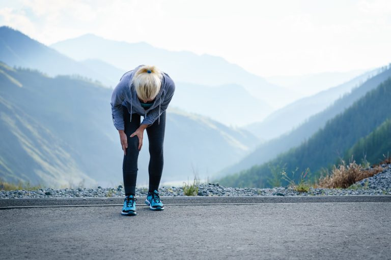 Injuries - sports running knee injury on woman. - Human Integrated Performance